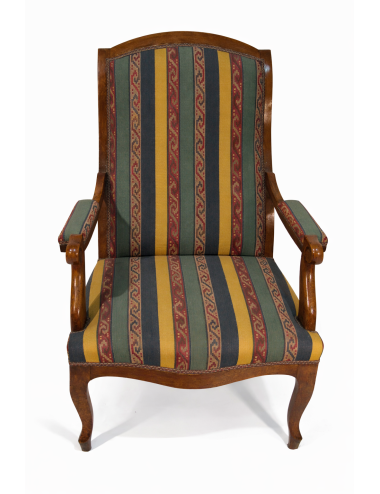 Poltrona epoca Luigi Filippo, con sedile, schienale e braccioli imbottiti. Struttura in legno di noce