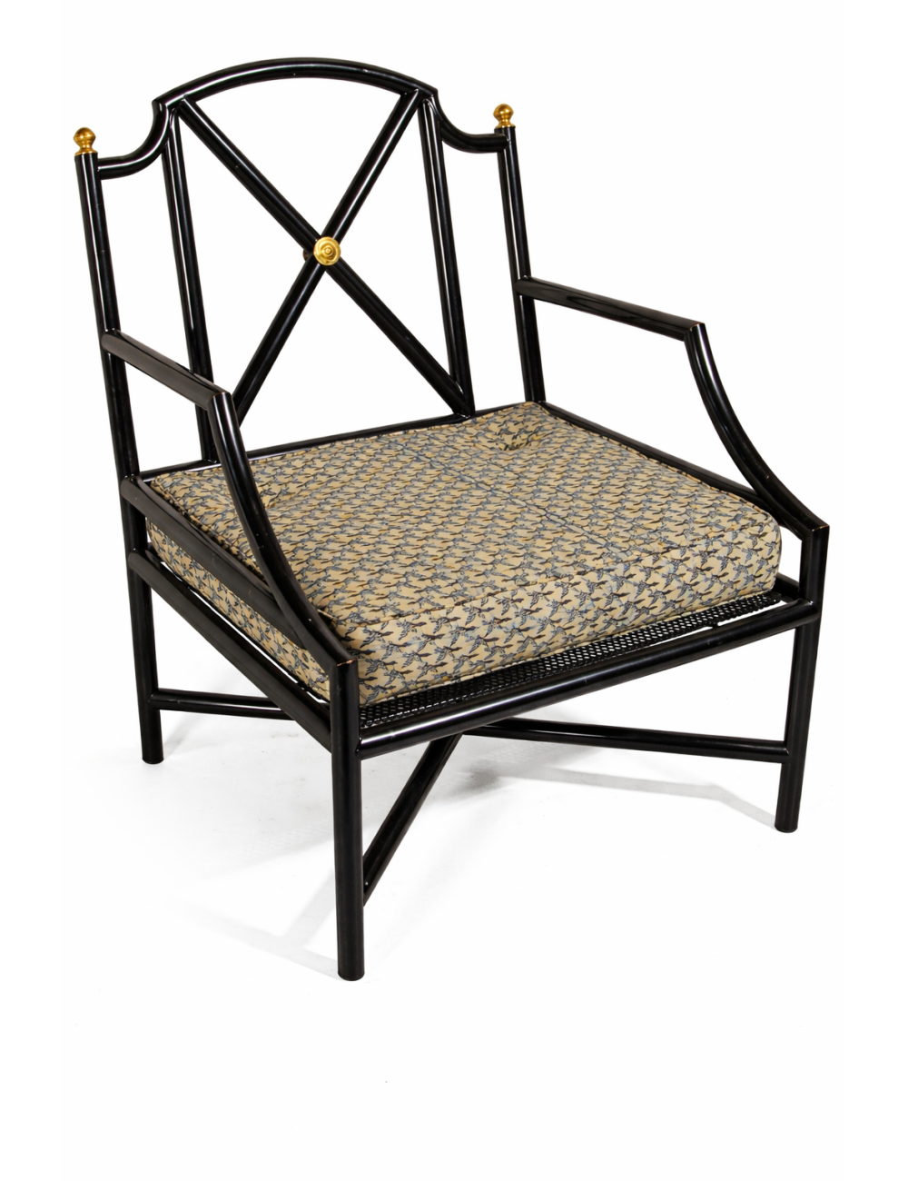 Poltrona in ferro laccato, sedile imbottito, decori in ottone. Modello riproducibile