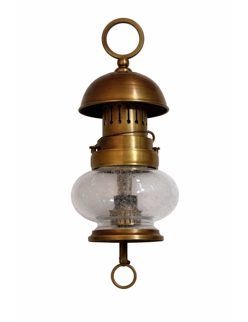 Burnished brass wall sconces with modern glass