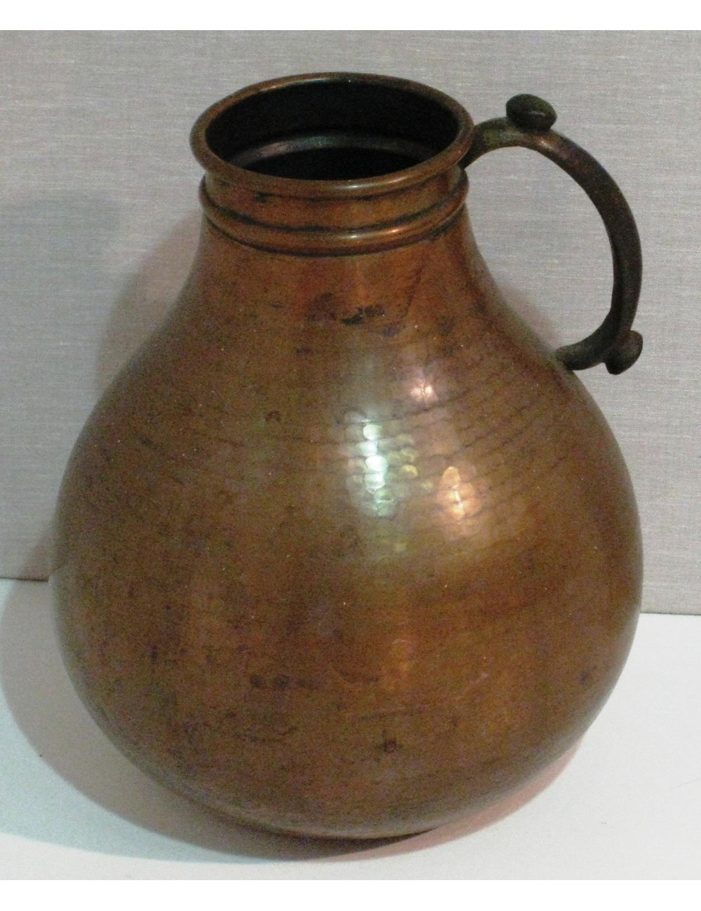 Modern copper and brass pitcher