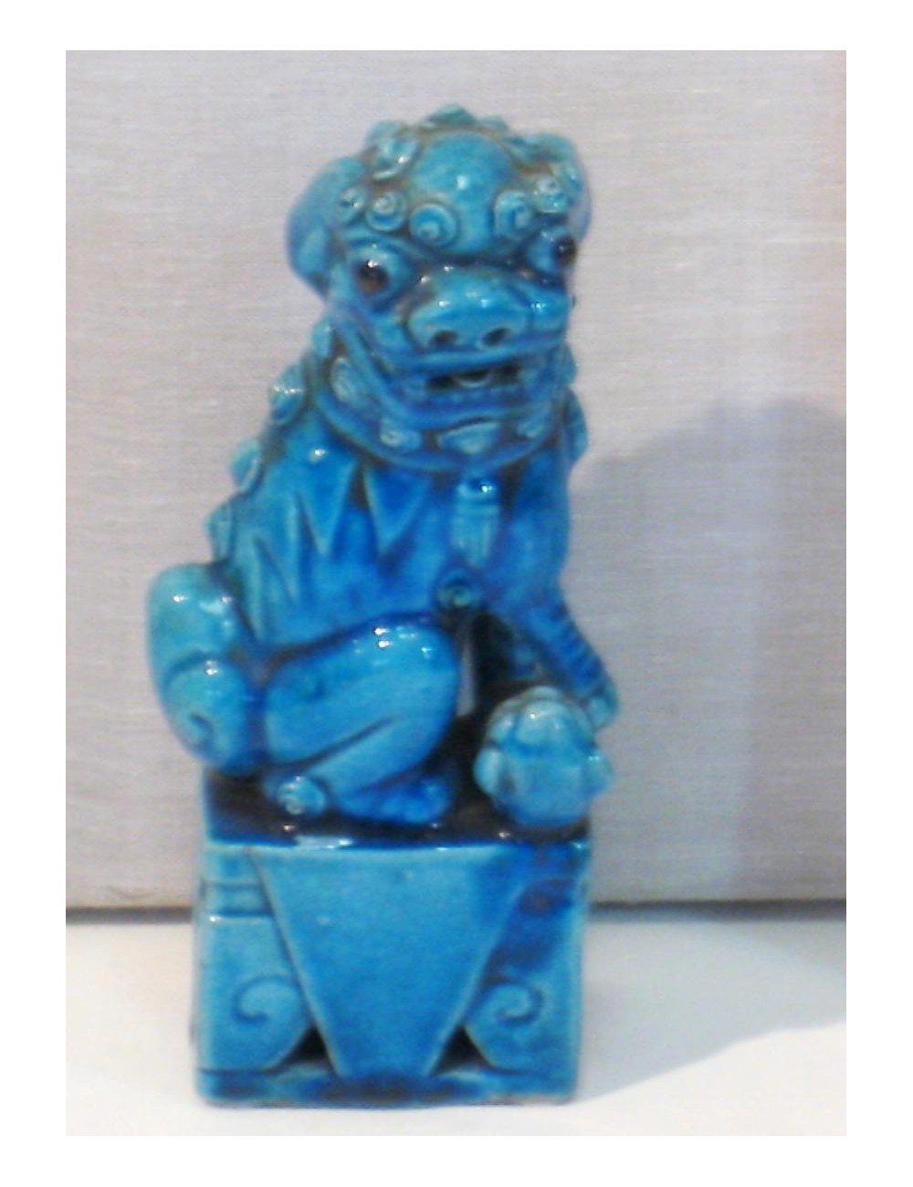 Scultura in ceramica smaltata raffigurante "cane di Fo"