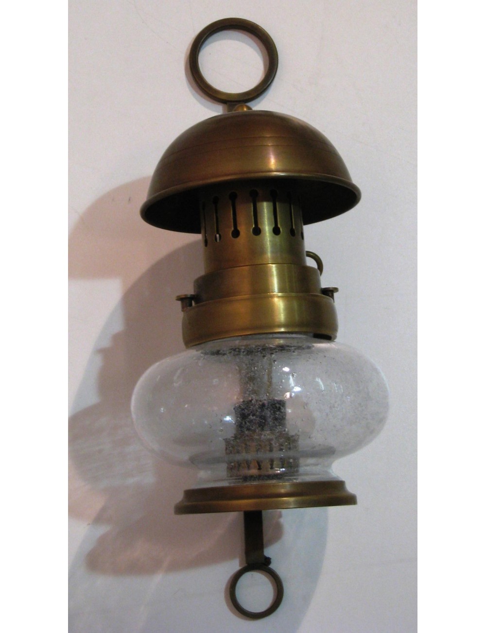 Burnished brass wall sconces with modern glass Burnished brass wall sconces with modern glass