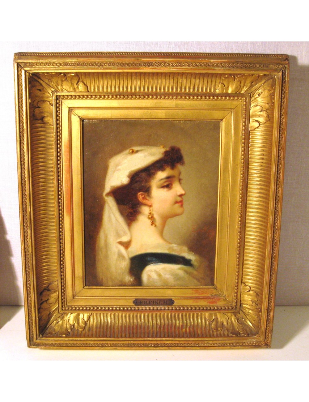 Cornice d'oro "donna" firma illeggibile