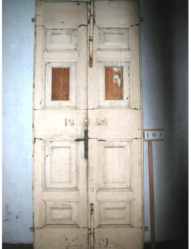 2-leaf door in need of restoration