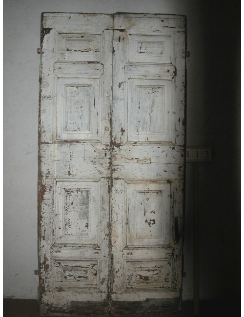 2-leaf door in need of restoration
