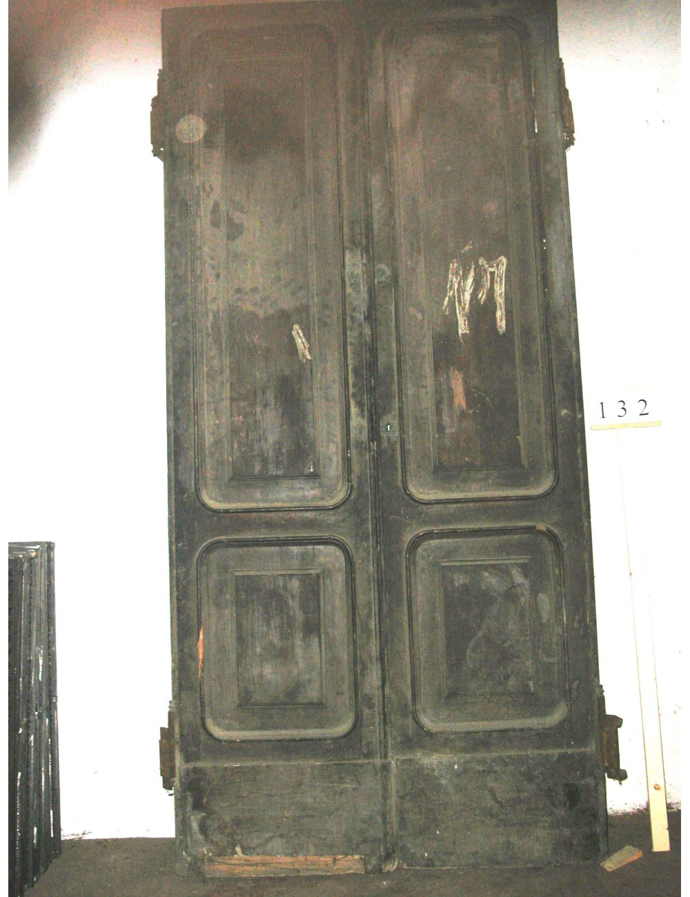 2-leaf door in need of restoration
