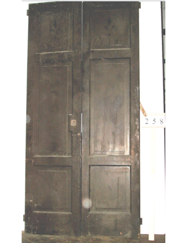2-leaf door in need of restoration