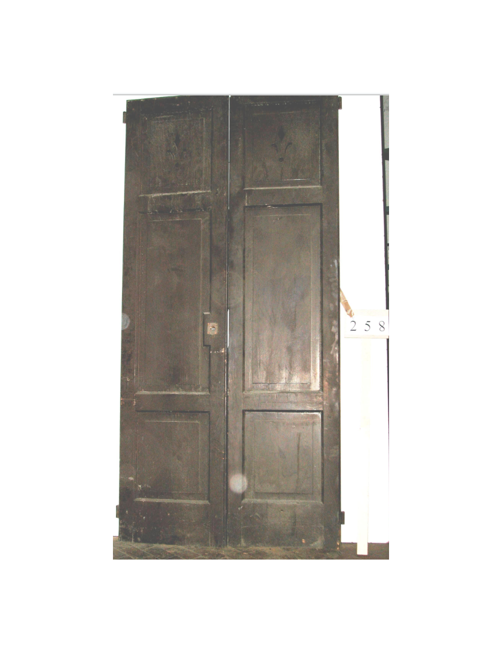 2-leaf door in need of restoration