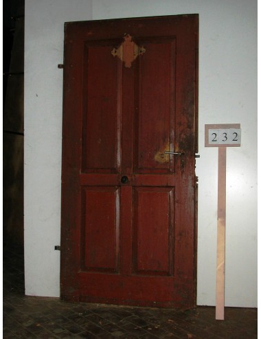 Porta in abete a quattro specchiature