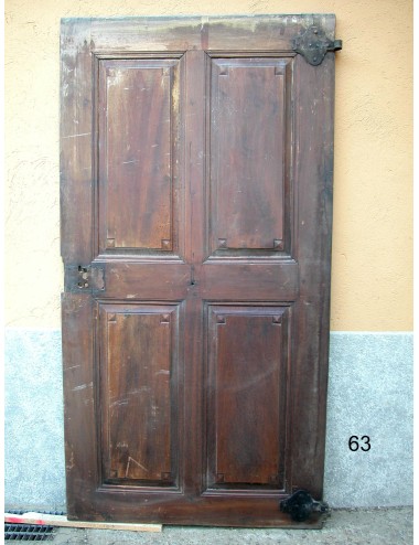 Battente in noce a quattro specchiature