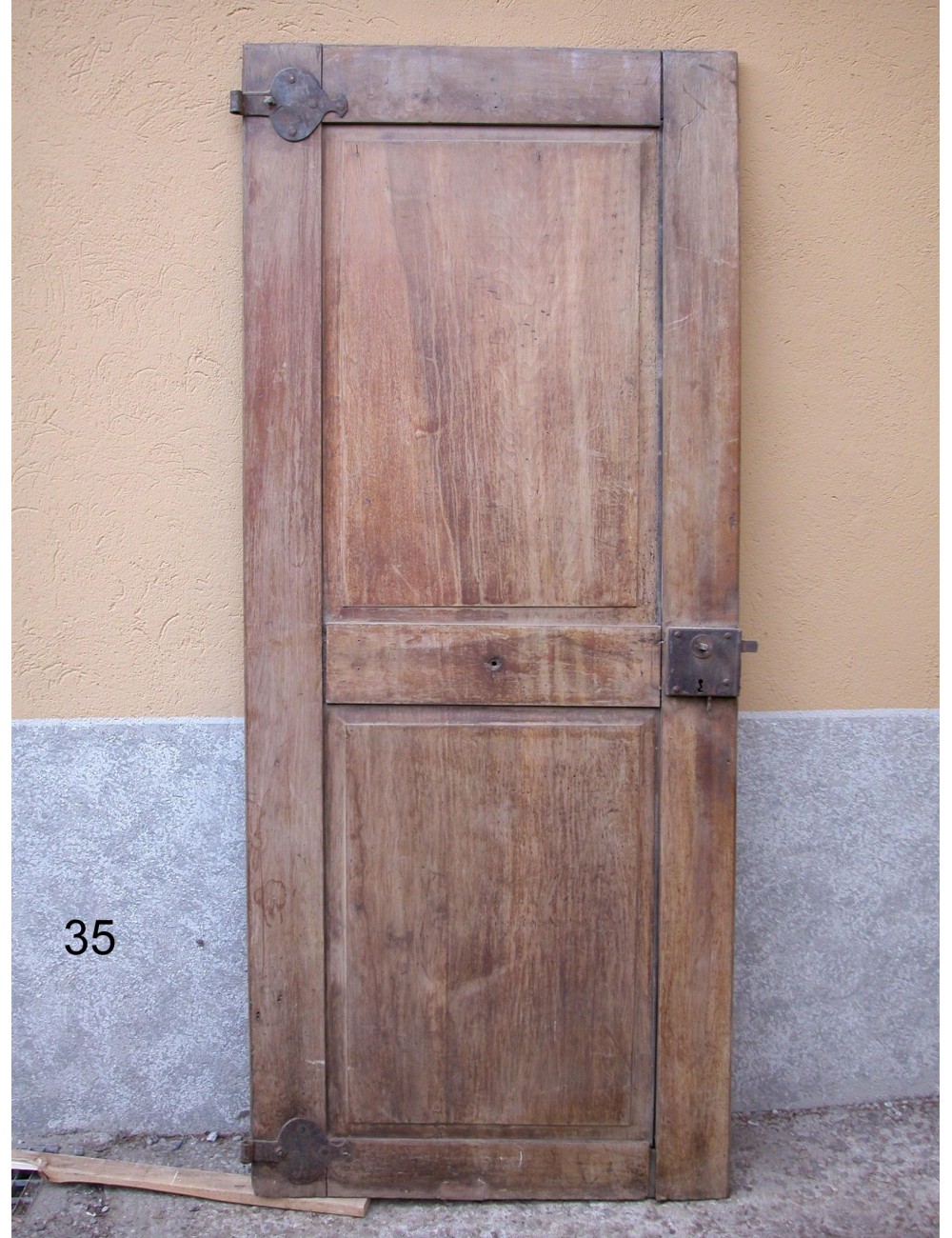 Walnut door with 2 plain panels in need of restoration Walnut door with 2 plain panels in need of restoration