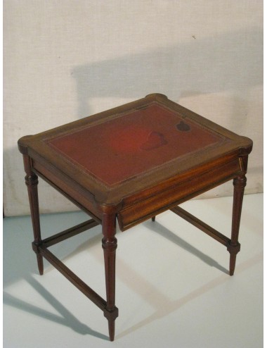 Square coffee table with red leather top