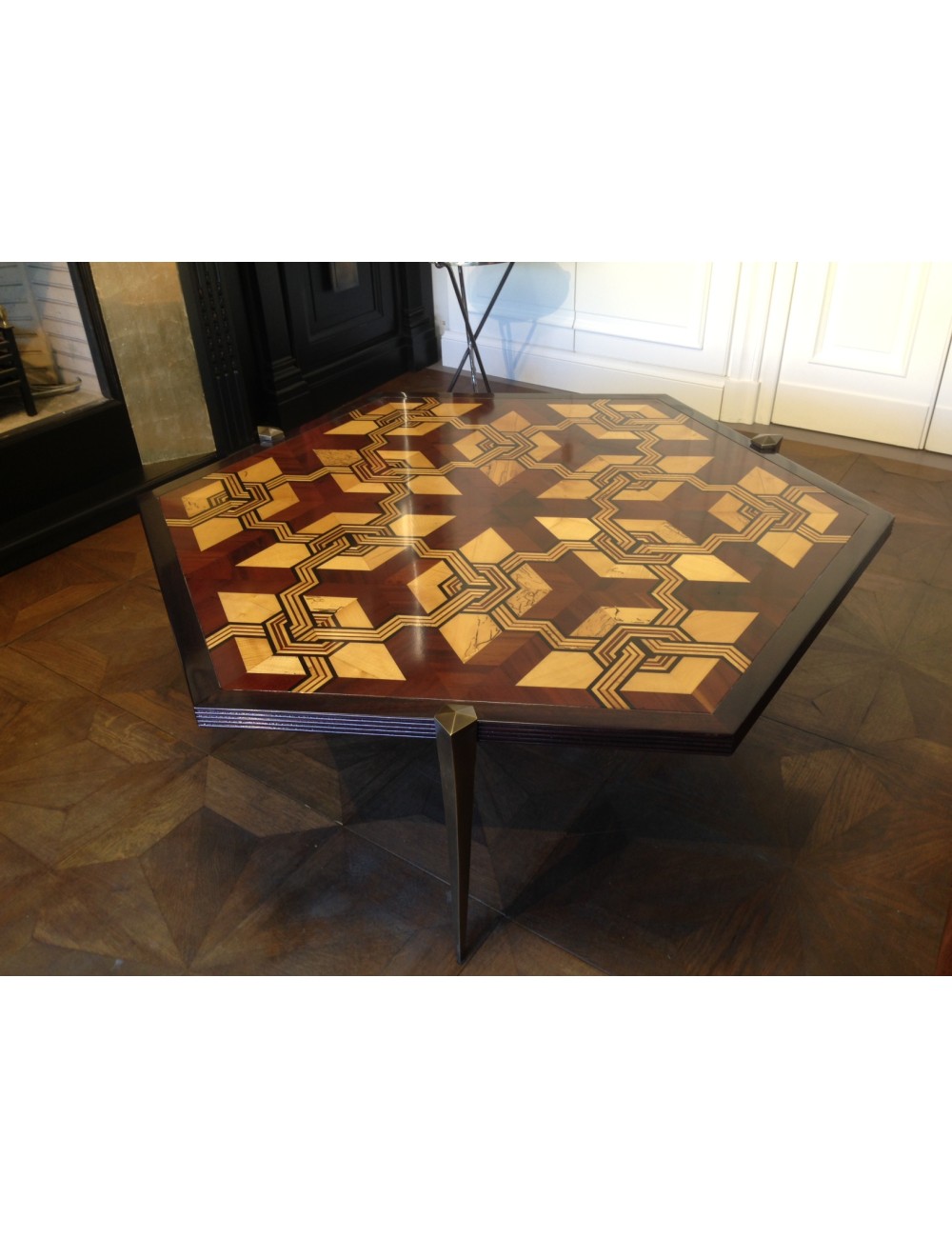 Low hexagonal table with modern inlaid wooden top Low hexagonal table with modern inlaid wooden top
