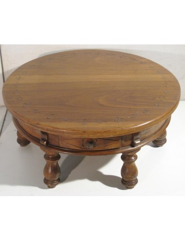Round coffee table with modern carvings