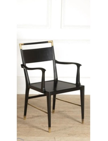 Black wooden armchair with modern brass inserts