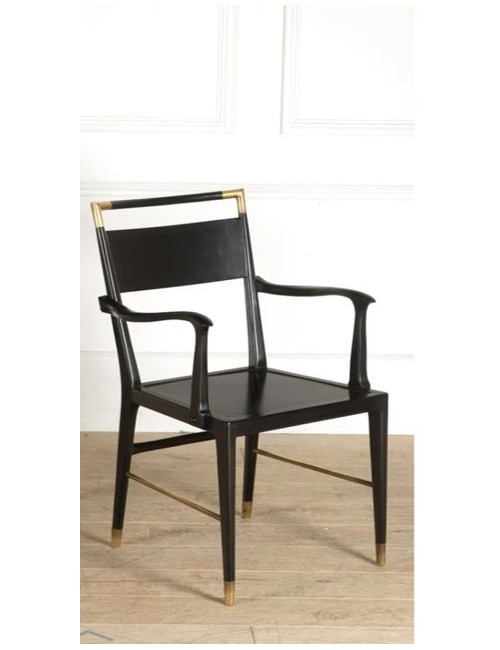 Black wooden armchair with modern brass inserts