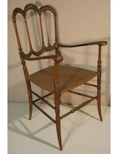 Golden armchair with straw seat