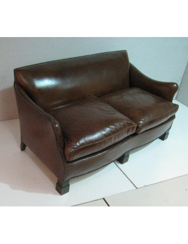 Divano a due posti 146x68x45/67H cm+ 1 poltrona in pelle 71X65X45/67 cm in stile moderno