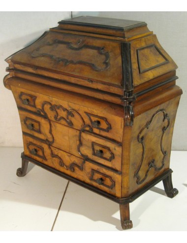 Three-drawer lomb. style shelves in walnut-root with modern eboniz. profile