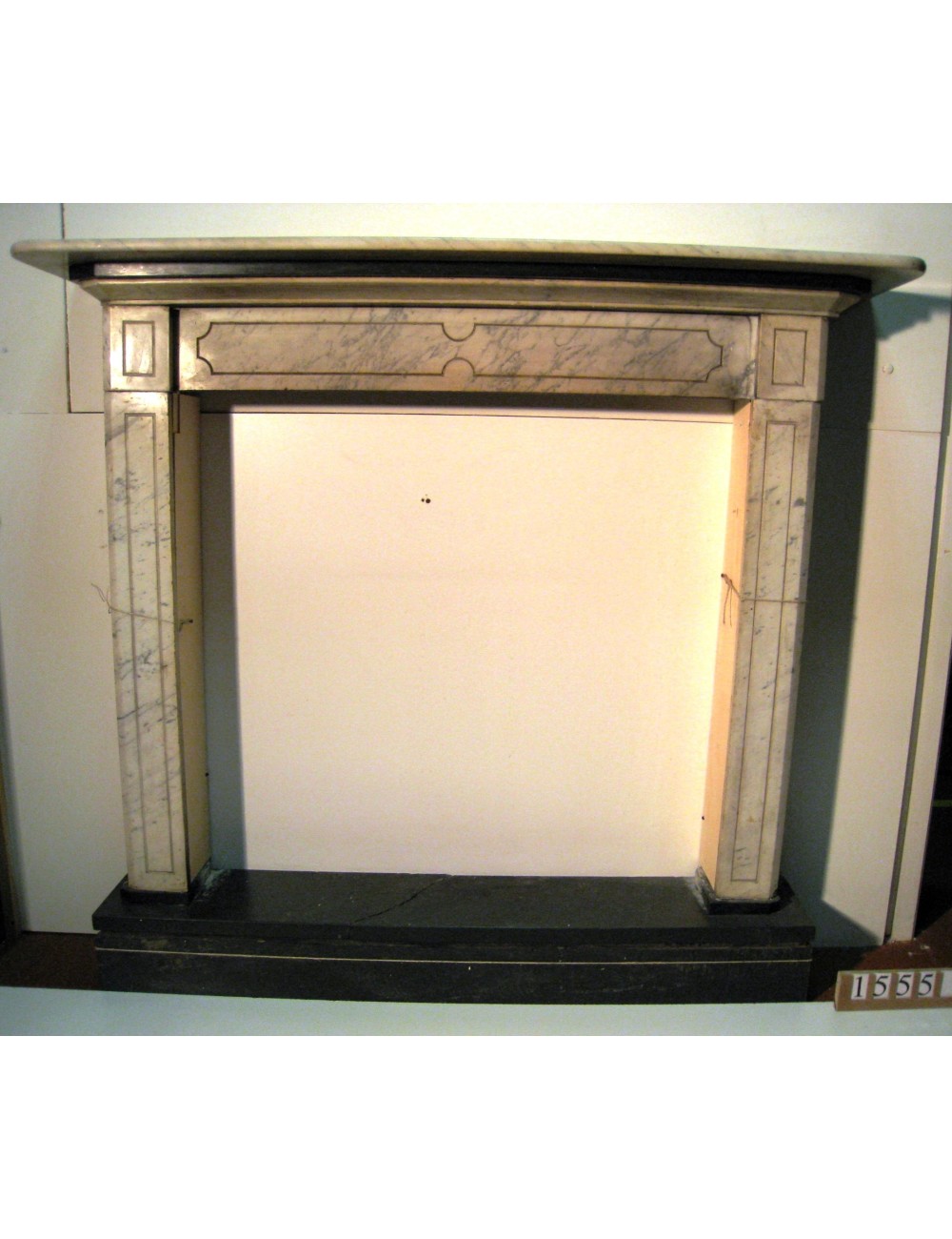 Baroque style fireplace white marble with black insert Baroque style fireplace white marble with black insert