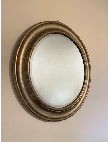 Modern silver-framed round mirror