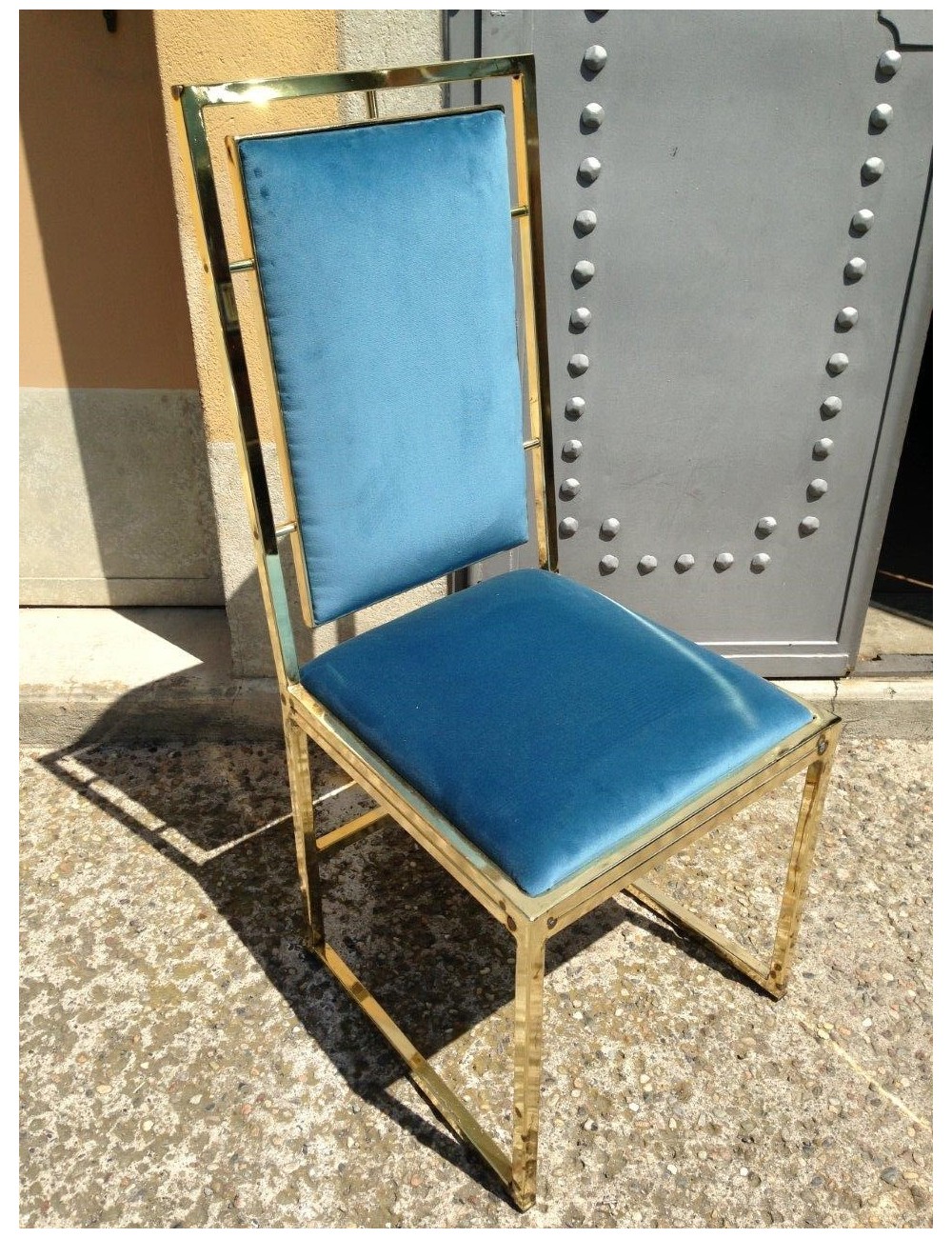Modern brass finish metal chair