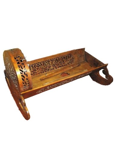 Carved cradle