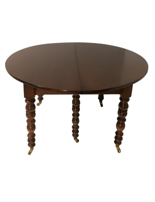 Oval walnut table (4 extensions missing)