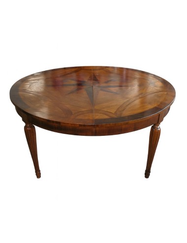 Extending walnut table with inlays on modern top