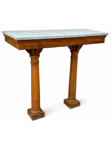 Consolle in legno con piano in marmo chiaro, caratterizzata da un’estetica Impero