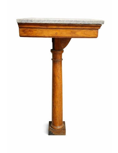 Consolle in legno con piano in marmo chiaro, caratterizzata da un’estetica Impero