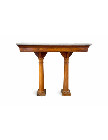 Consolle in legno con piano in marmo chiaro, caratterizzata da un’estetica Impero