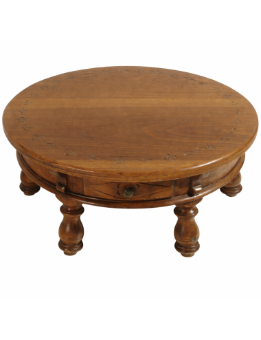 Round coffee table with modern carvings