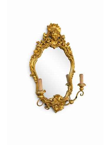 Mirror with wall sconce